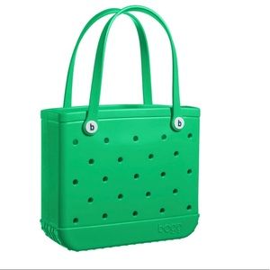 Green NWT and in plastic wrap green Baby BOGG bag.